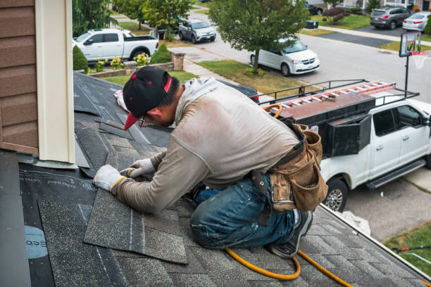 Professional Roofing technician working in Houghton, IA